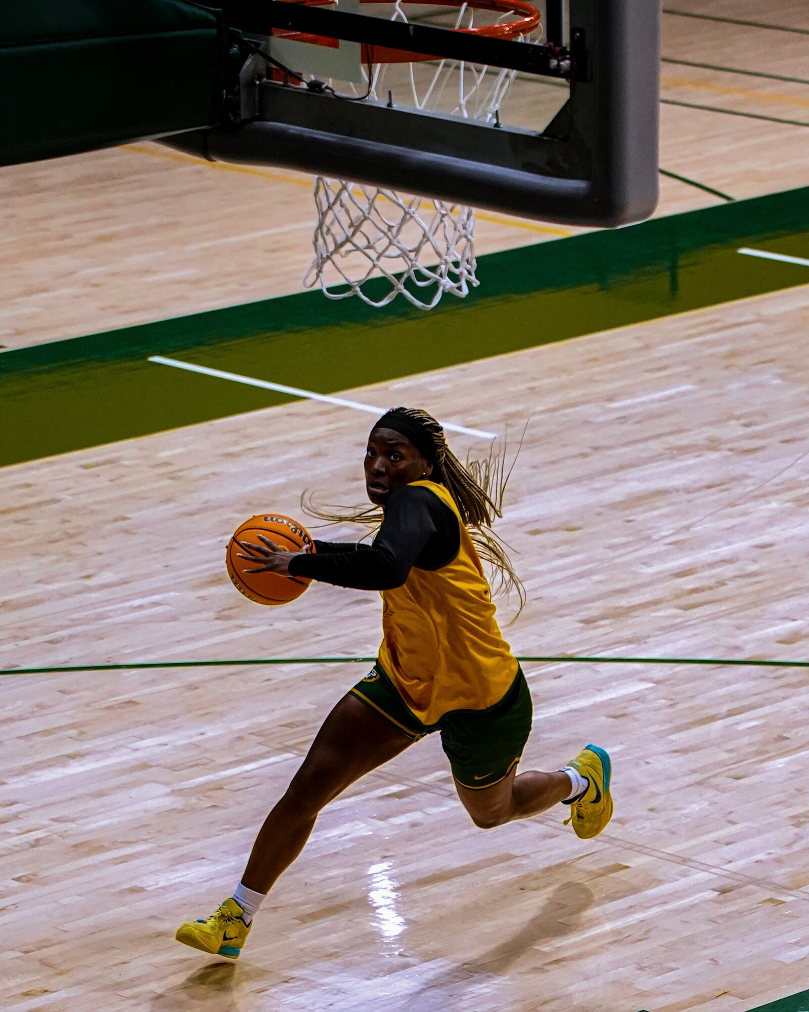 USF Dons coach directing practice at half court