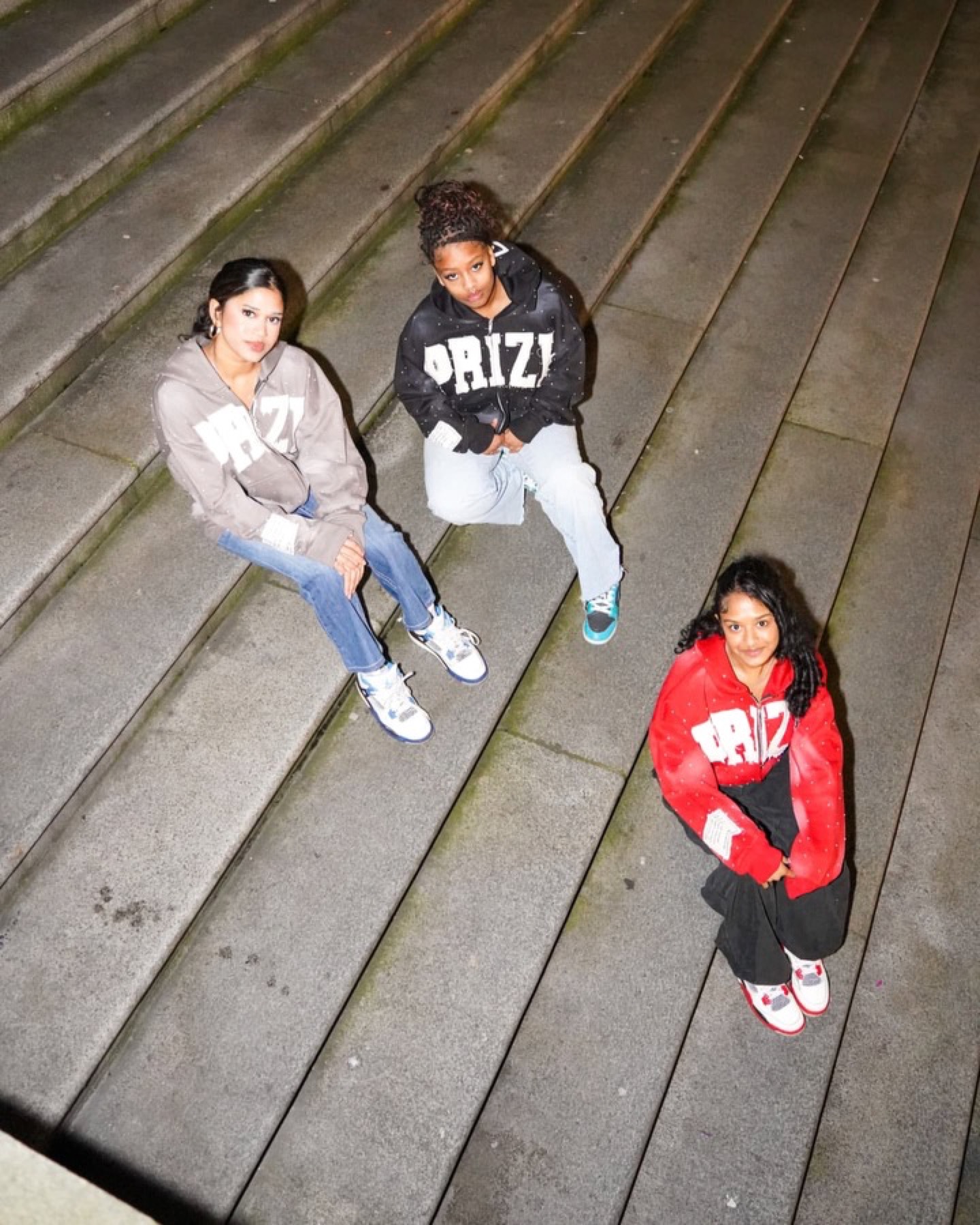 Night editorial group shoot on concrete steps